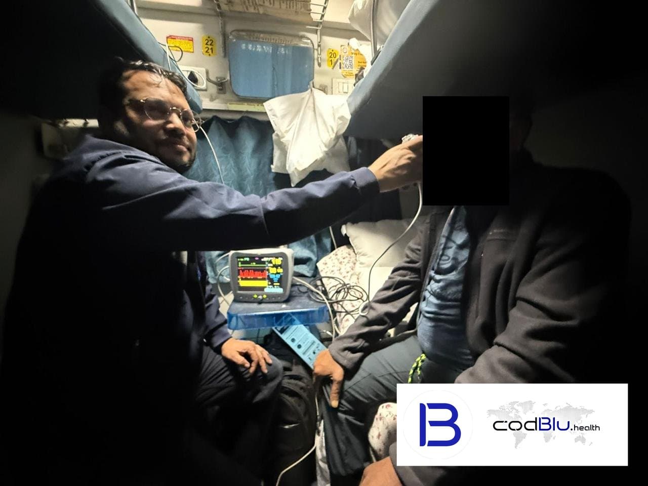 Rail ambulance doctor managing oxygen support during a night train journey