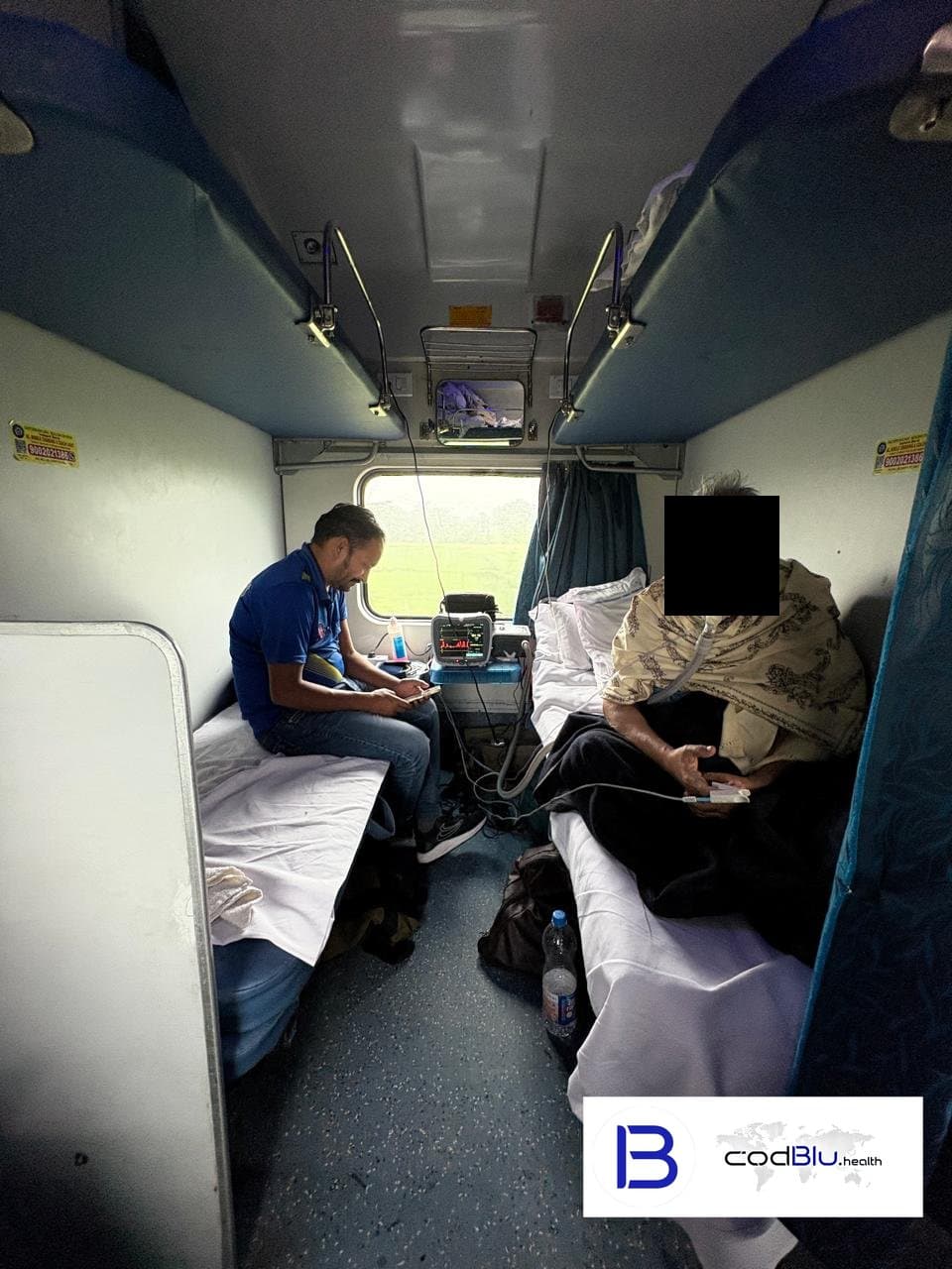 CodBlu Healthcare rail ambulance – patient on oxygen support in a Second AC coach