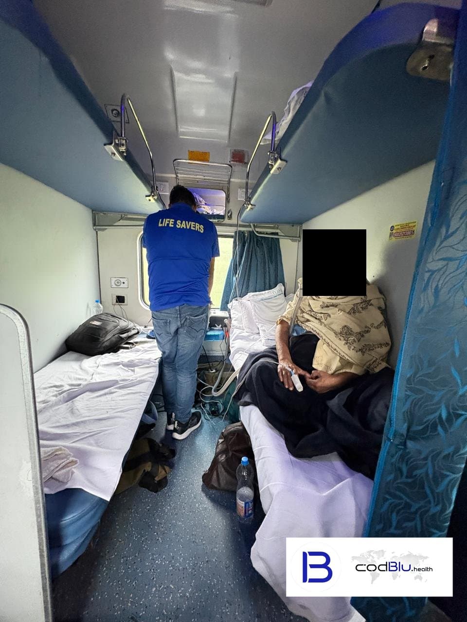 Patient on oxygen support during a medically supervised train transfer